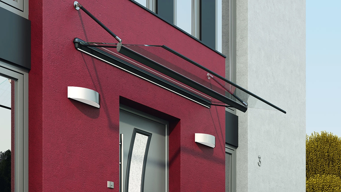 KOMPOtherm Glasvordach mit pulverbeschichteten Aluminiumteilen und Aufhäng-Halterung
